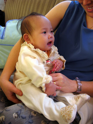 Her first long sleeve outfit, for the plane